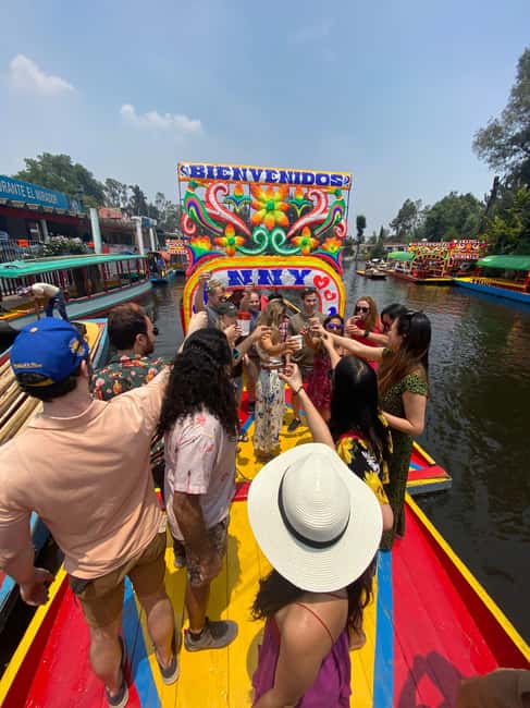 Mexico City: Xochimilco Boat with Guacamole & Premium Drinks - Meeting at the Purple Arches