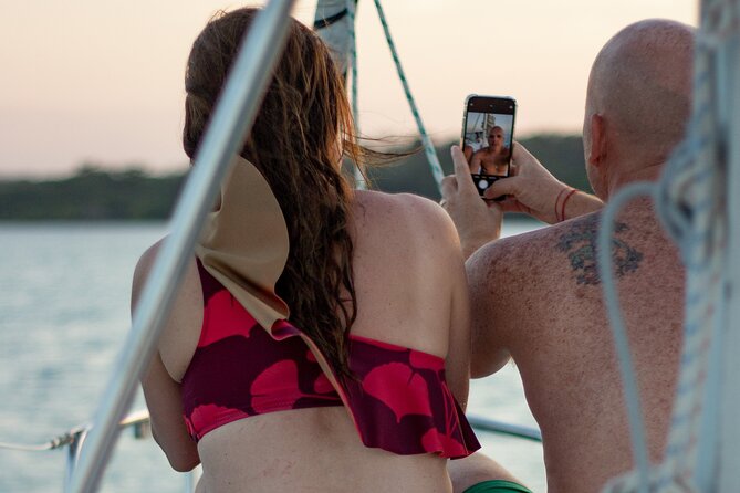 Private Sailboat + Captain for a Day Experience - Cenote de la Bruja and the lagoon’s changing blues