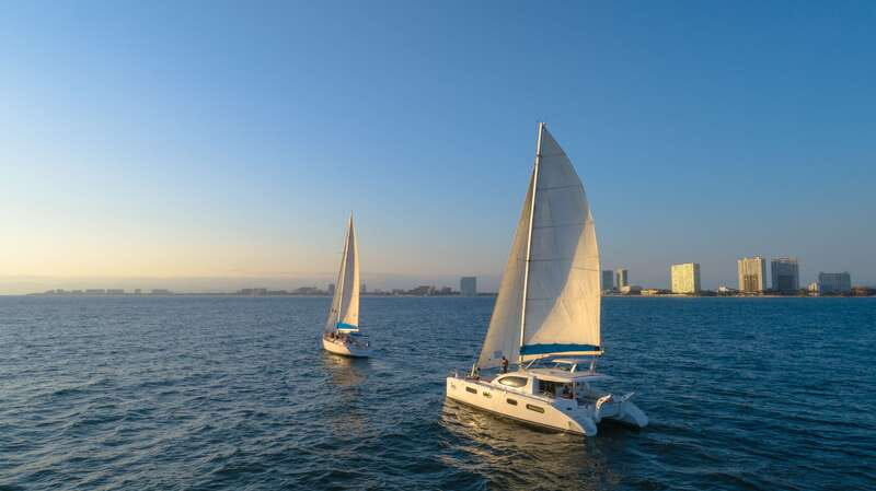 Puerto Vallarta: Bay of Banderas Luxury Sunset Sailing Tour - Settling aboard the luxury sailboat