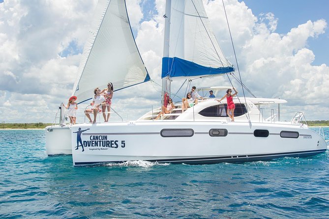 Riviera Maya Luxury Snorkeling Cruise with Lunch and Drinks - Swimming, paddleboarding, and water mats