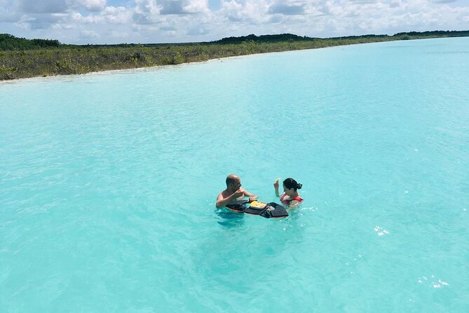 Sailing Tour through the Laguna de los Siete Colores - Cenote Negro and the 180-meter drop