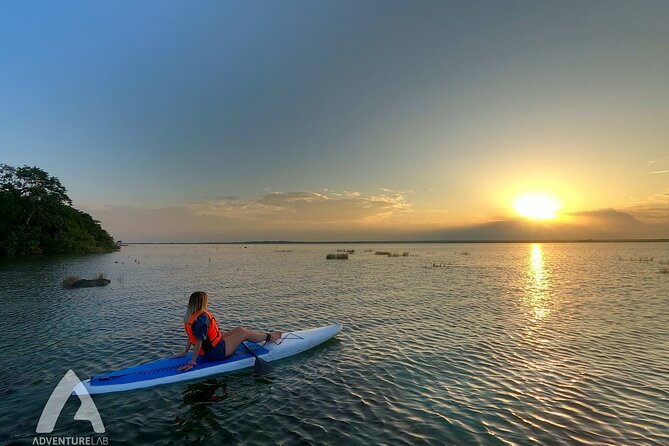 Sunrise Paddle Quest: Embrace the Dawn on Bacalar's Waters - Crossing Lake Bacalar with help from the guide