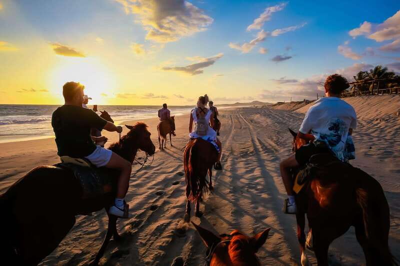 Sunset by Horse on the Beach - Through fields, cattle land, and water