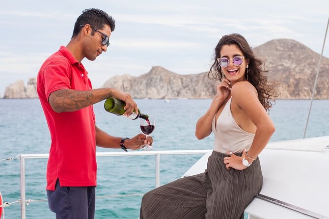 Sunset Cruise in Los Cabos with Jazz and Wine - Boarding the Tropicat catamaran