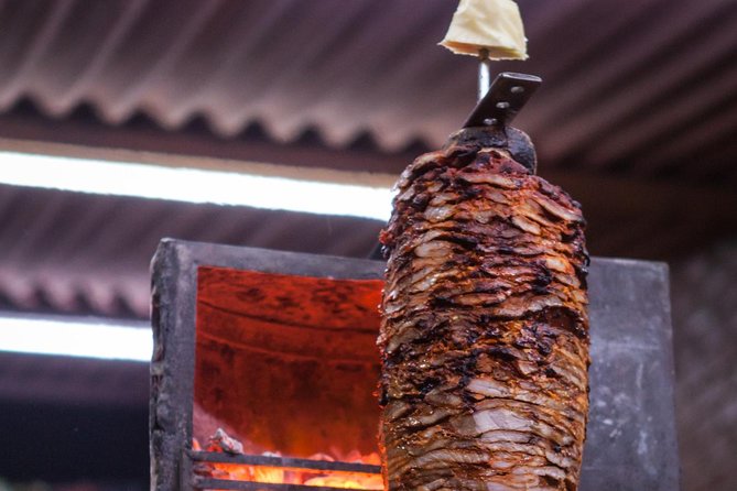 Taco Adventure Evening Food Tour with Vallarta Food Tours - Learning the al pastor tradition at El Carboncito
