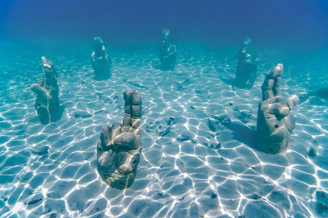Top Isla Mujeres Catamaran Tour with Snorkel Open Bar and Buffet lunch - The real price, transport, and pickup details