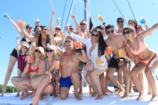 Top Isla Mujeres Catamaran Tour with Snorkel Open Bar and Buffet lunch - Leaving Cancun on the catamaran