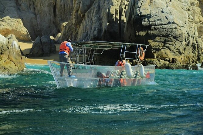 Tour to Arch in the only Clear Boat in Cabo Cruise Hotel PICKUP! - Pelican Rock and the fish below