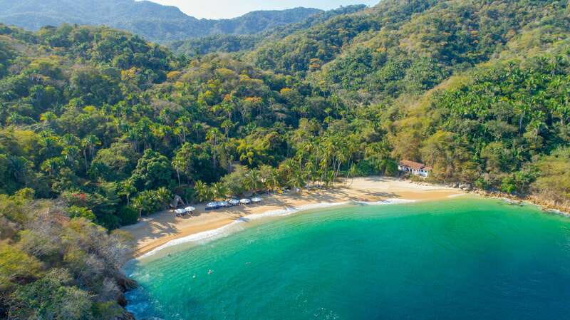 Vallarta: Yelapa Waterfall & Majahuitas Snorkel Adventure - Yelapa: village streets, tropical scenery, and Cola de Caballo
